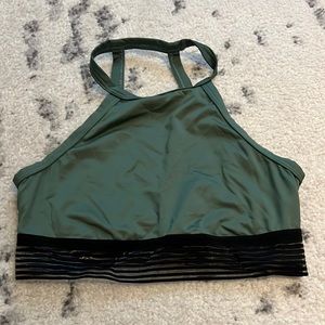 Victoria’s Secret sports bra, size medium in dark green color